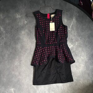 L'ATISTE Peplum Black Dress with Vibrant Cutout Pink Accents